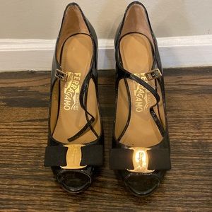 Salvatore Ferragamo black pattern pumps